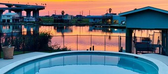 Beautiful beach house boasts a scenic water view from its front and back doors.