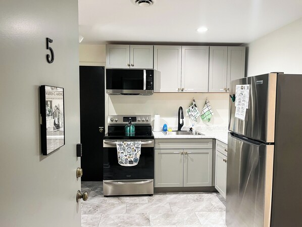 Fridge, microwave, oven, stovetop