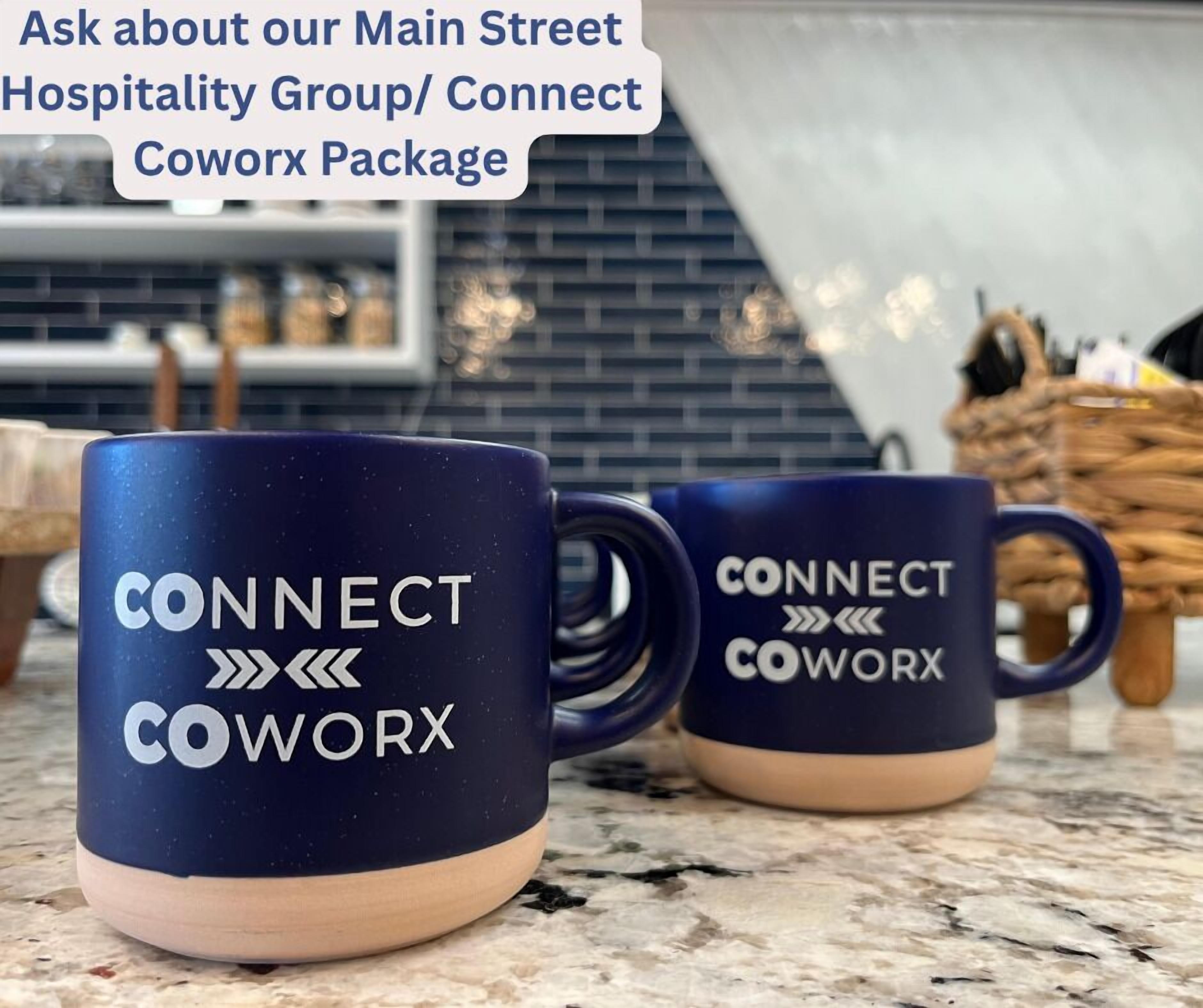 Two mugs with the text 'CONNECT COWORK' on a countertop.