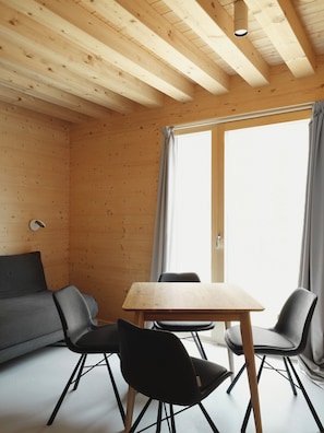Superior Condo | Living area | Heated floors - Mondholz - Urban Inn 24-7 (Innsbruck)