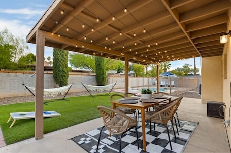Outdoor dining. Pool Fire Pit Ping-Pong