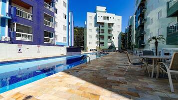 Indoor pool, outdoor pool, open 9:00 AM to 10:00 PM, pool umbrellas