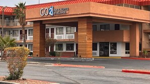A hotel with a red roof and a sign that reads "GO2 INN & SUITES BYRELIANCE". - GO2 Inn & Suites by Relianse  (El Paso)