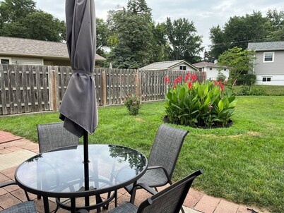 Quiet neighborhood surrounded by parks near multipurpose trail through QC
