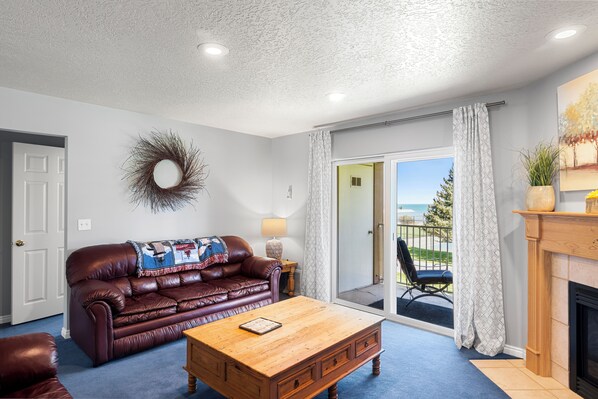 TV, fireplace - Condo - #310 | 2 Bed, 2 Bath (Garden City)