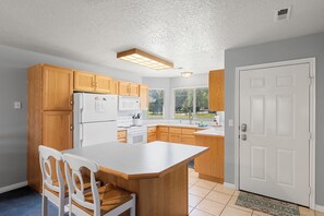 Fridge, microwave, oven, stovetop - Condo - #310 | 2 Bed, 2 Bath (Garden City)