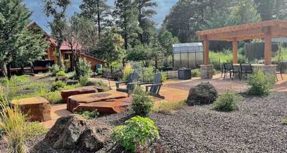 Cheerful Cabin with large stone patio and hot tub, next to trails!!