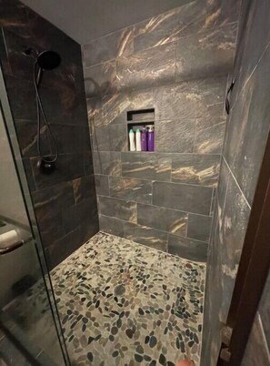 Shower, hair dryer, towels, soap