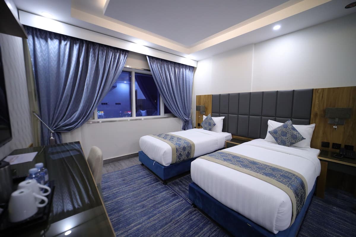 2 chambres, coffres-forts dans les chambres