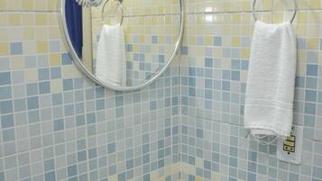 Hair dryer, towels, soap, shampoo