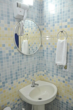 Hair dryer, towels, soap, shampoo