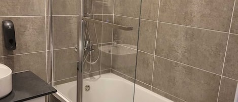 Hair dryer, towels, soap, toilet paper