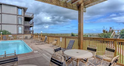10 steps away till sand in your toes on the ocean front in Carolina Beach, NC.