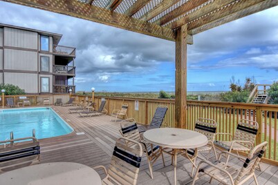 10 steps away till sand in your toes on the ocean front in Carolina Beach, NC.