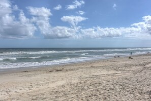 On the beach, sun loungers