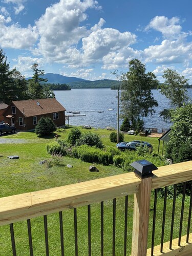 Beautiful lakefront camp with sunset view over big moose mountain
