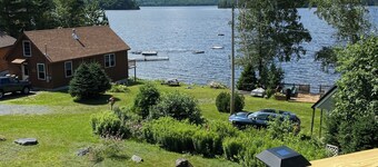 Beautiful lakefront camp with sunset view over big moose mountain