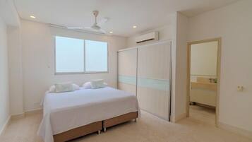 Premium bedding, memory foam beds, desk, laptop workspace