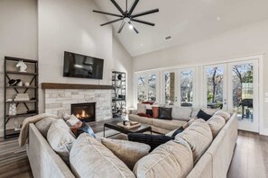 Smart TV, fireplace, books