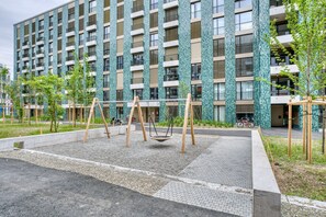 Children’s area - Chic Wollishofen 1BR w/ Storage & W/D, nr Local Market, by Blueground (Zurich)