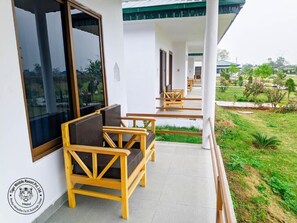 Deluxe Double Room, 2 Bedrooms, Smoking, Garden View | Terrace/patio - Tiger Wildlife Resort (Jagatpur)