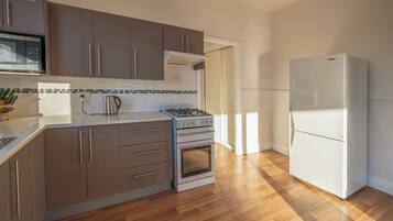 Classic House | Private kitchen | Full-sized fridge, microwave, oven, stovetop