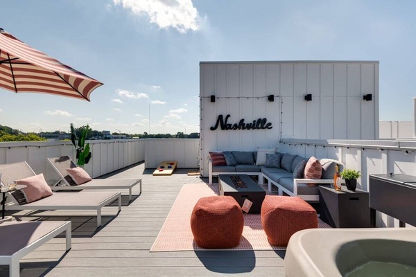 Relaxing Rooftop Lounge with Fire Pit for Gatherings and Relaxation