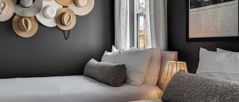 4 bedrooms, desk, iron/ironing board, travel cot