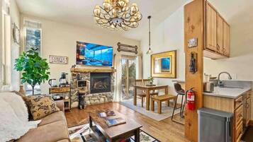 TV, fireplace, books, offices