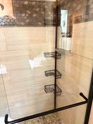 Shower, hair dryer, towels, shampoo