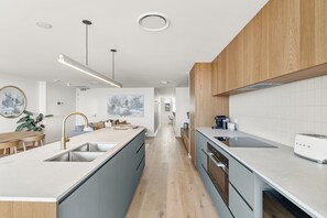 Fridge, microwave, oven, stovetop - Dunes 2 -  brand new coastal contemporary 2 bedroom apartment (Ballina Shire)