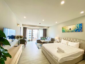 Superior Studio, 1 King Bed, Partial Sea View | Desk, laptop workspace, free WiFi, bed sheets - Wise Stay Gold Coast Apartment (Nha Trang)