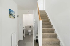 Bathtub, hair dryer, towels