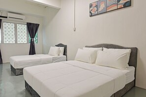 Habitació triple, bany compartit | Wifi gratuïta i roba de llit 