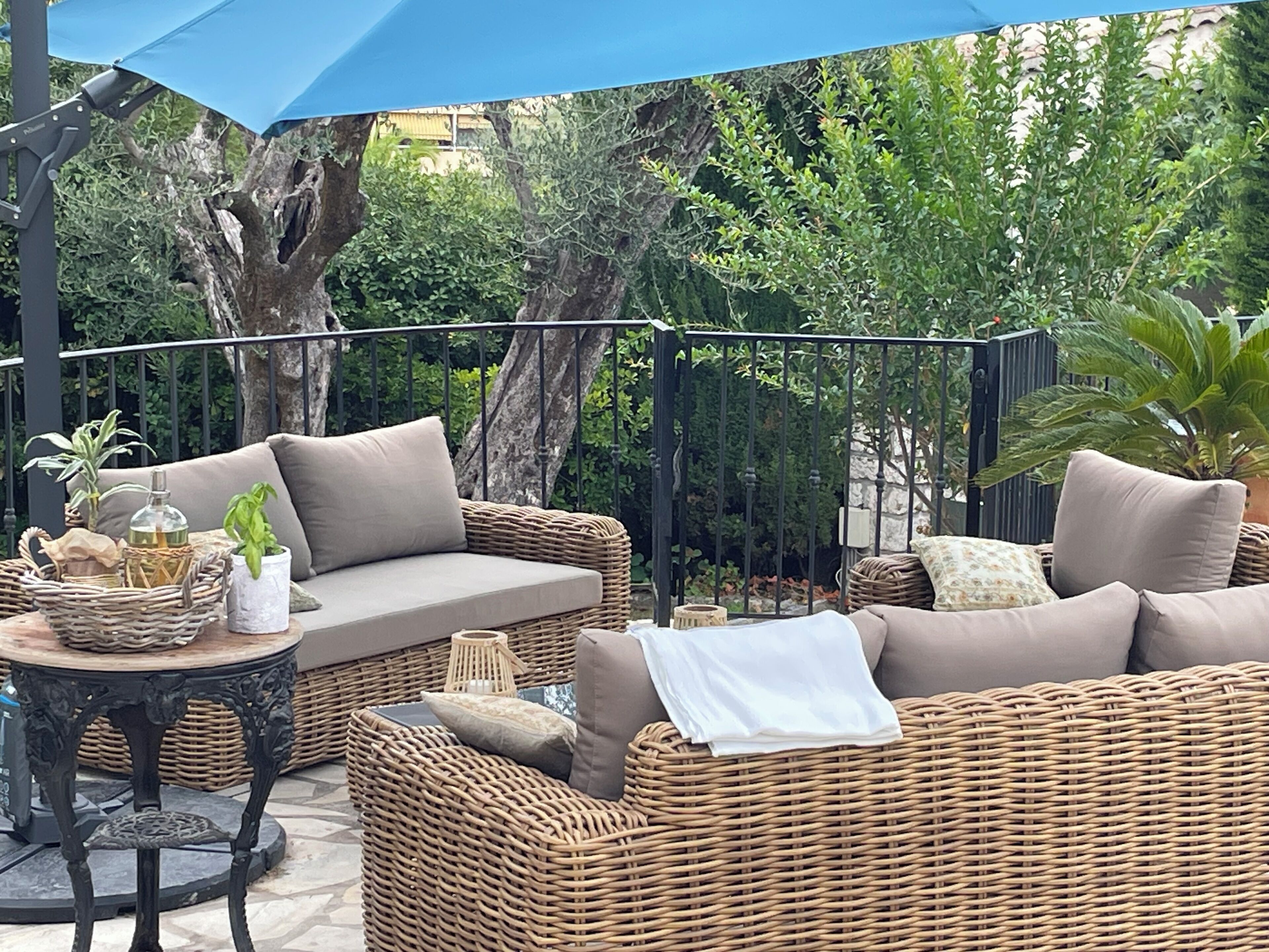 Poolside seating & table with umbrella