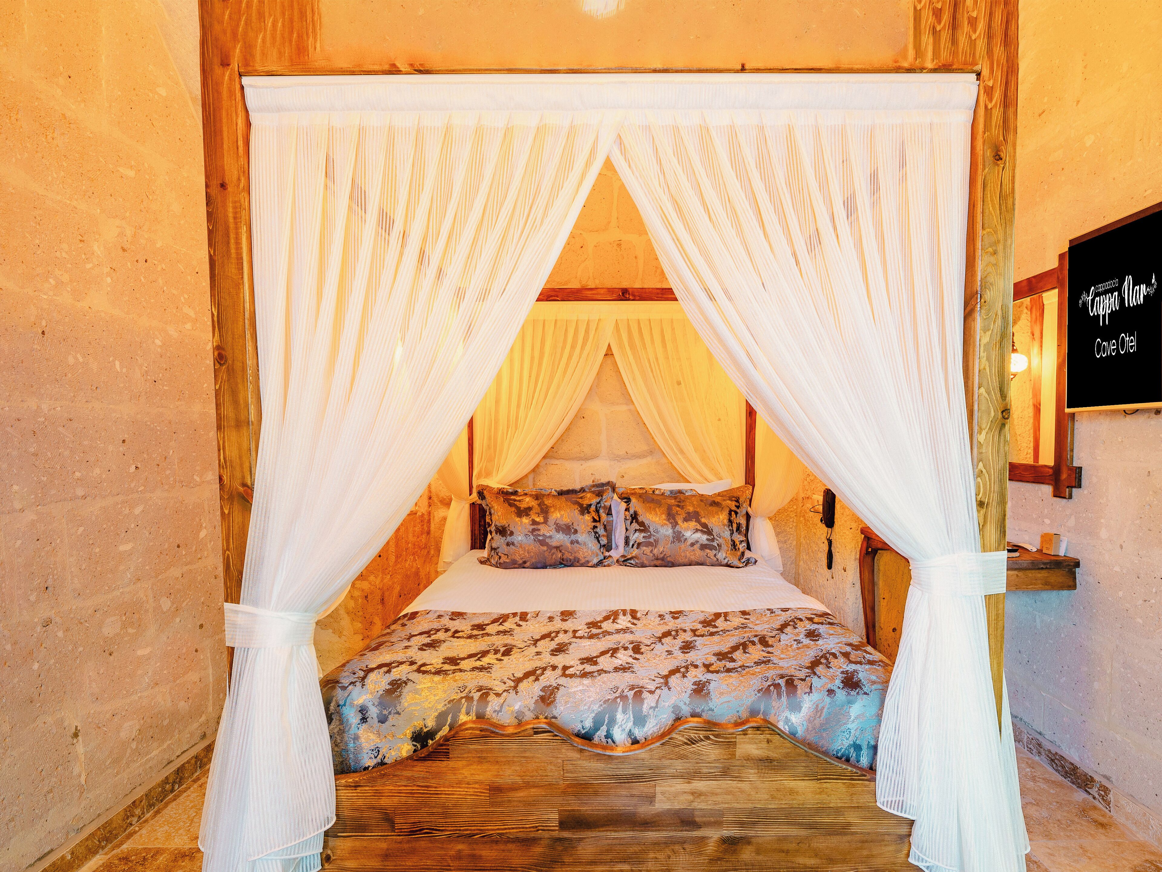 Sultan Deluxe Stone Room | Hochwertige Bettwaren, individuell dekoriert, individuell eingerichtet