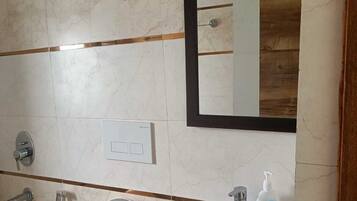 Shower, towels, soap, shampoo