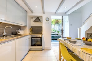 Fridge, dishwasher, electric kettle, toaster