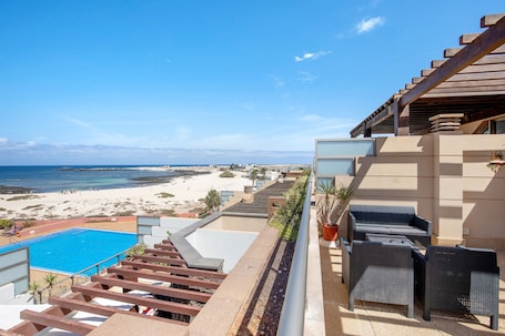 Terrace/patio. Vacation Home "Vistas Paraíso" with Sea View, Shared Pool & Wi-Fi