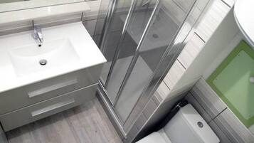 Regadera y secadora de cabello