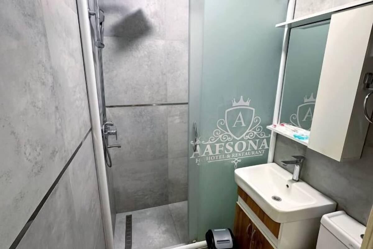 Hair dryer, slippers, towels, soap