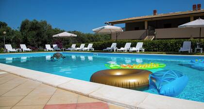 6-guest apartment, pool and beach, one step from Capo d'Orlando.