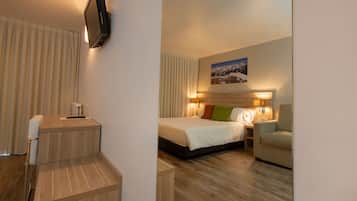 Quadruple Room | Minibar, in-room safe, desk, blackout curtains