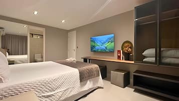 Habitació quàdruple | Matalassos amb encoixinament addicional i planxa i posts de planxar