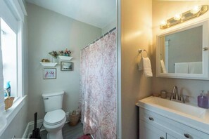 Bathtub, hair dryer, towels
