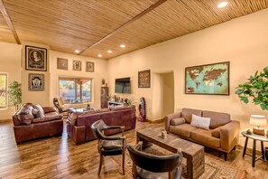 Family House | Living area | 45-inch LED TV with cable channels, Netflix, Hulu - La Puerta Azul- Stunning Desert Retreat; Pool/Spa (Tucson)