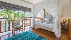 A bedroom with a canopy bed, wooden furniture, and a view of greenery outside. - One bedroom private pool romantic villa (Bali)