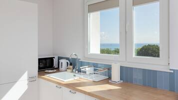 Departamento, 1 habitación, balcón | Cocina privada | Microondas, lavavajillas, cafetera y tetera y tetera eléctrica