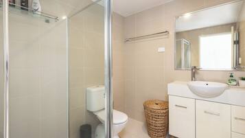 Shower, hair dryer, towels, soap