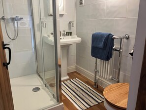 Shower, eco-friendly toiletries, hair dryer, towels